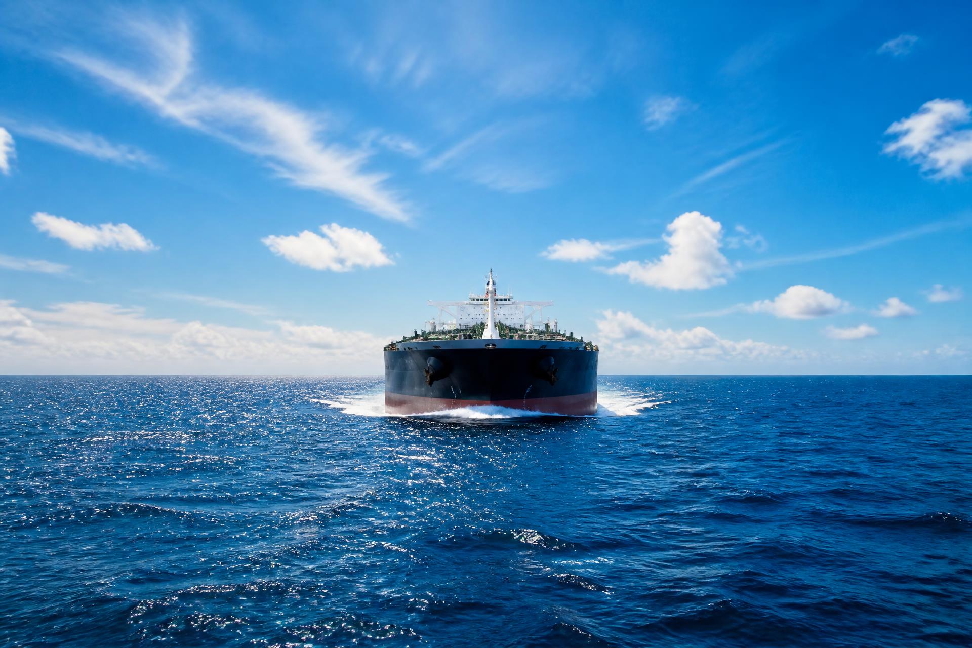 Cargo vessel sailing on the open sea